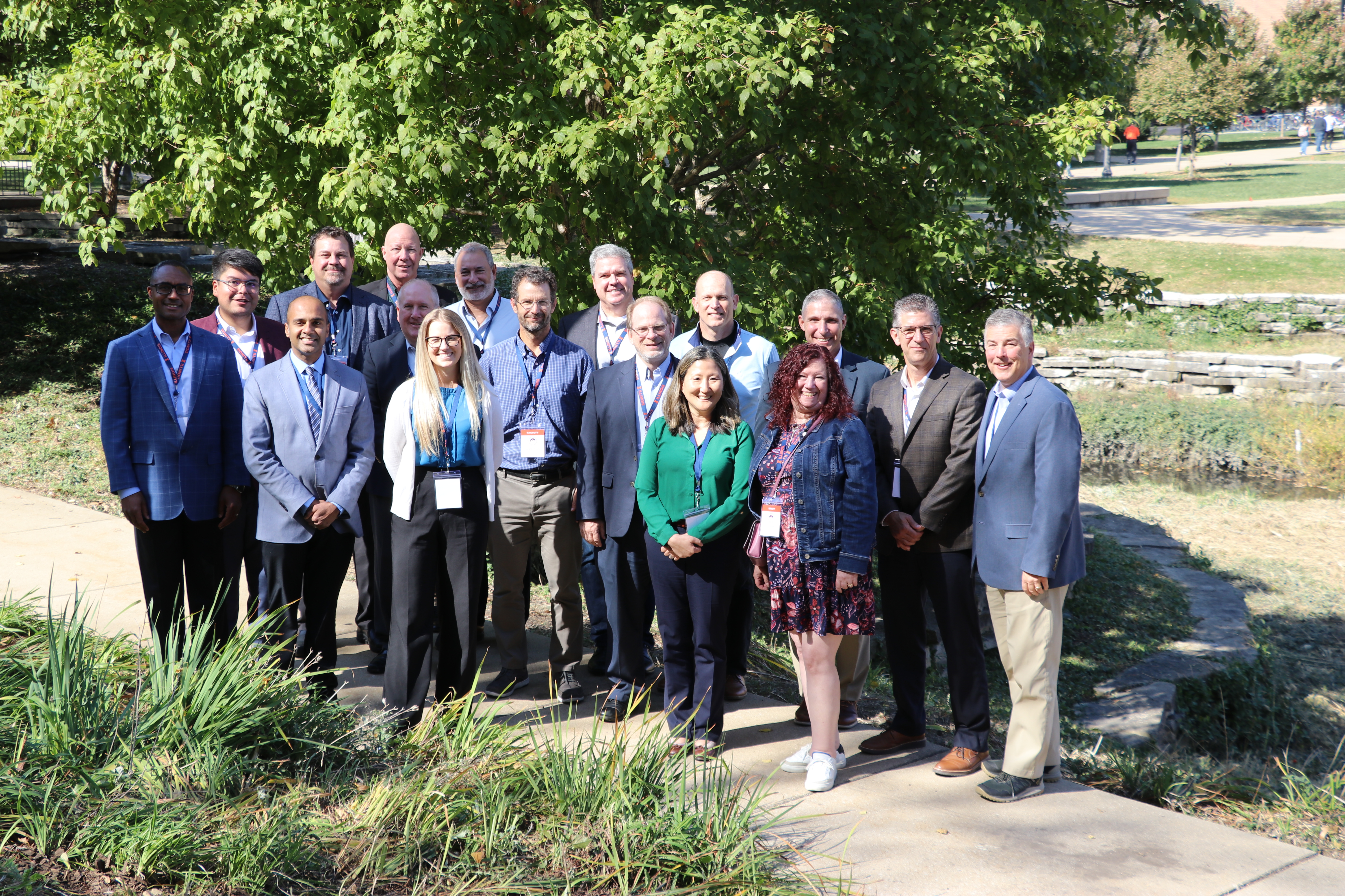 Craig Barton, far right, with Jonathan Freund, Tracy Elving, and members of the department&rsquo;s alumni advisory board at the annual meeting in October 2024.