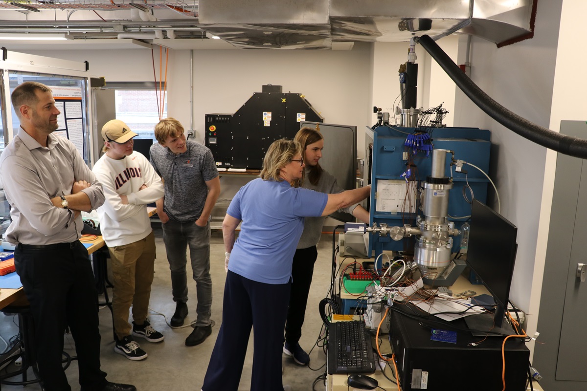 Left to right in the Laboratory for Advanced Space Systems at Illinois: AE faculty member  Matt Hausman, undergraduate students John LaRosa, Charles Cundiff and Ben Ochs, and Vicki Coverstone.