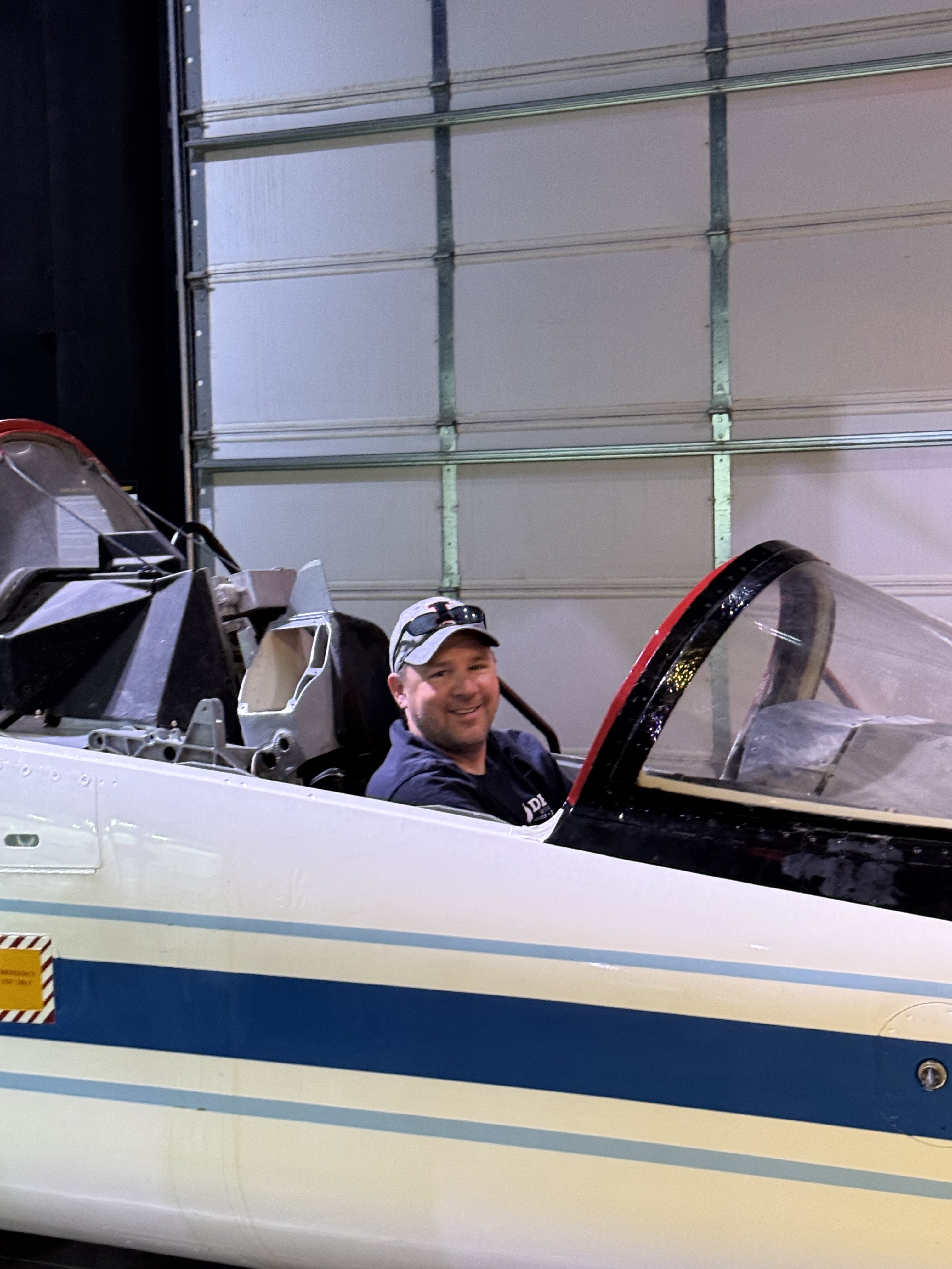 Prof. Merret in a cockpit from the DBF teams visit to PIMA Air and Space Museum in Tucson, AZ.