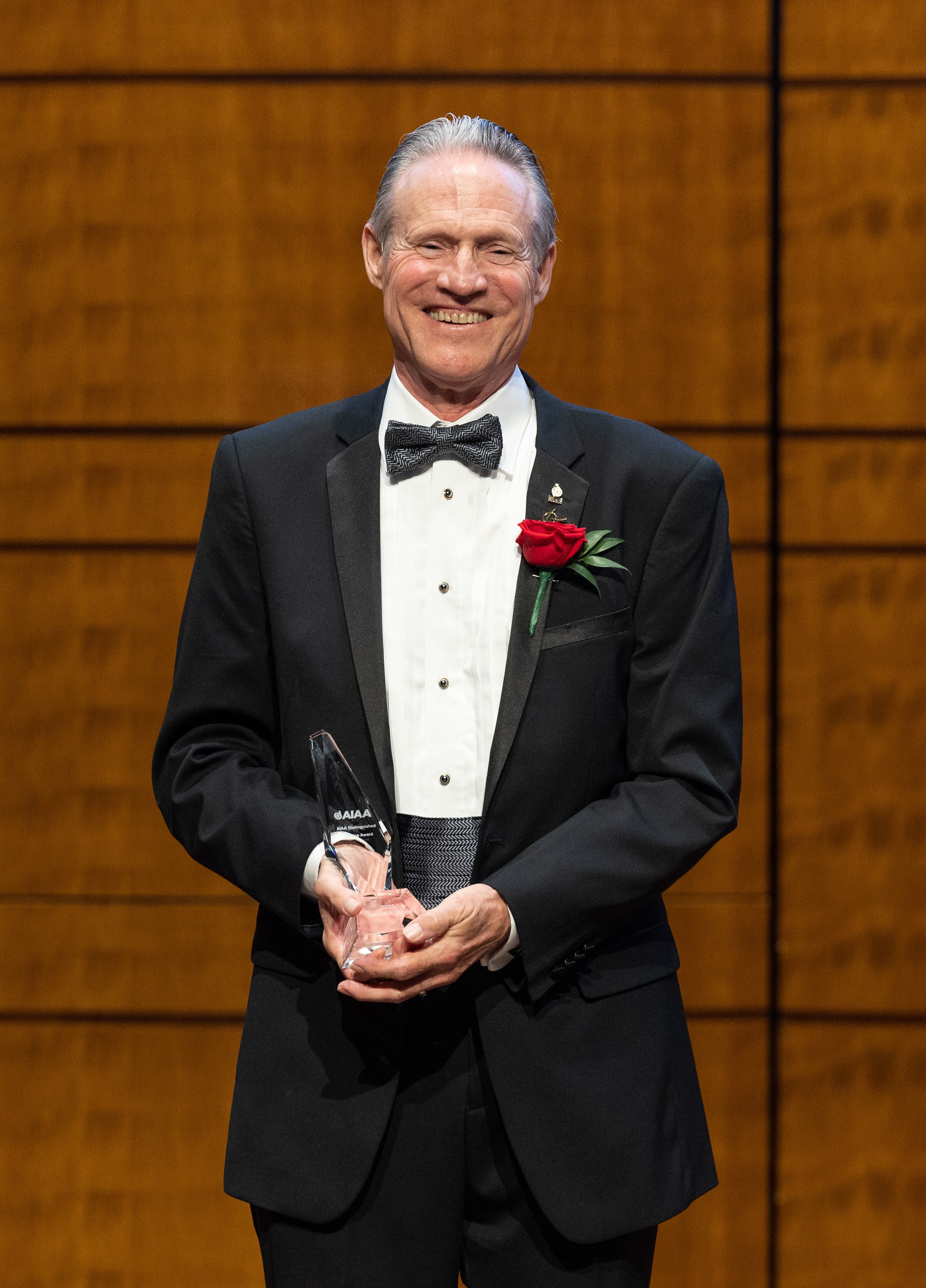 Riley at awards ceremony when accepting AIAA's 2023 Distinguished Service Award.