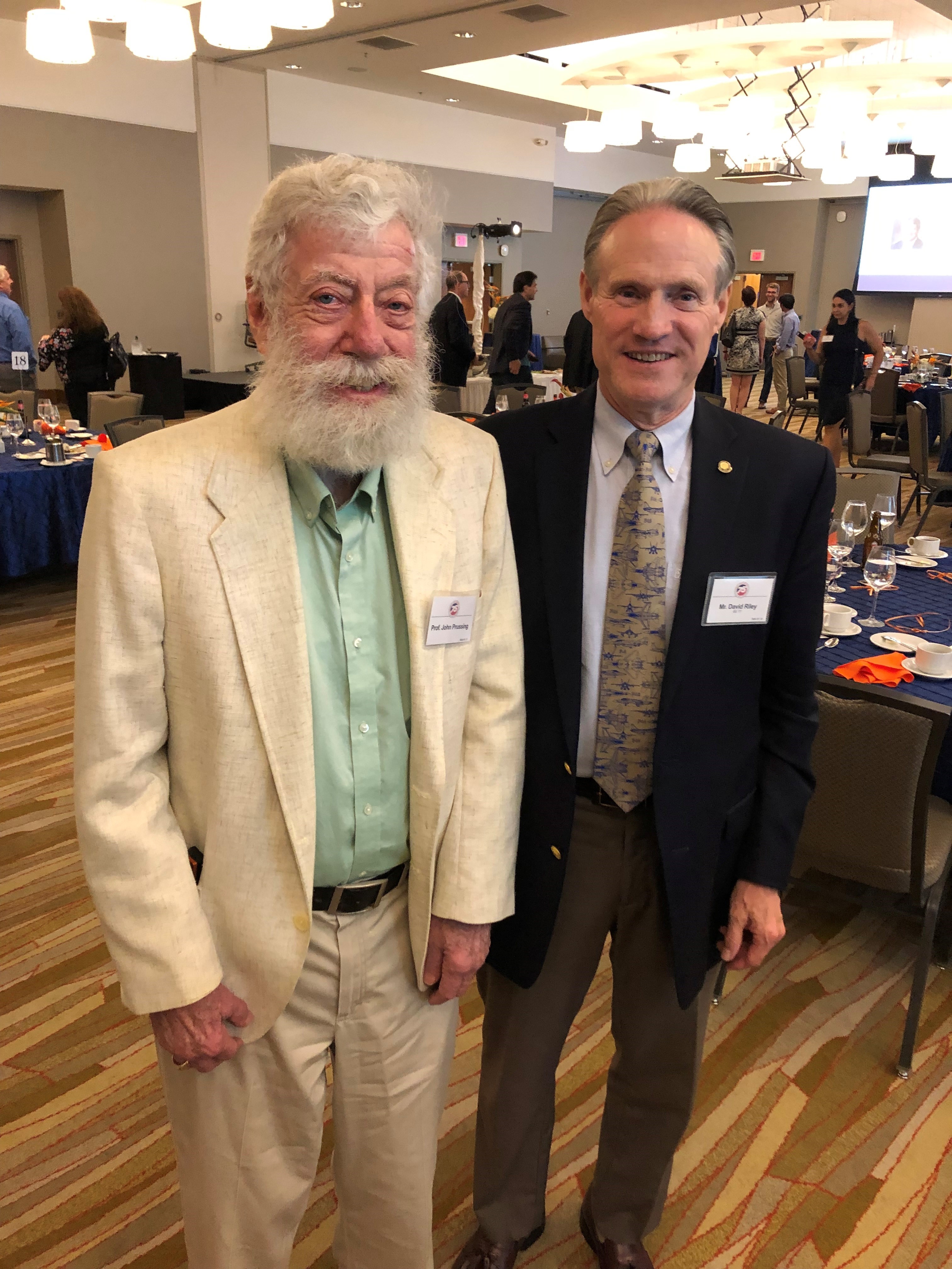 Professor John Prussing with Dave Riley at the department's 75th anniversary celebration in September 2019.