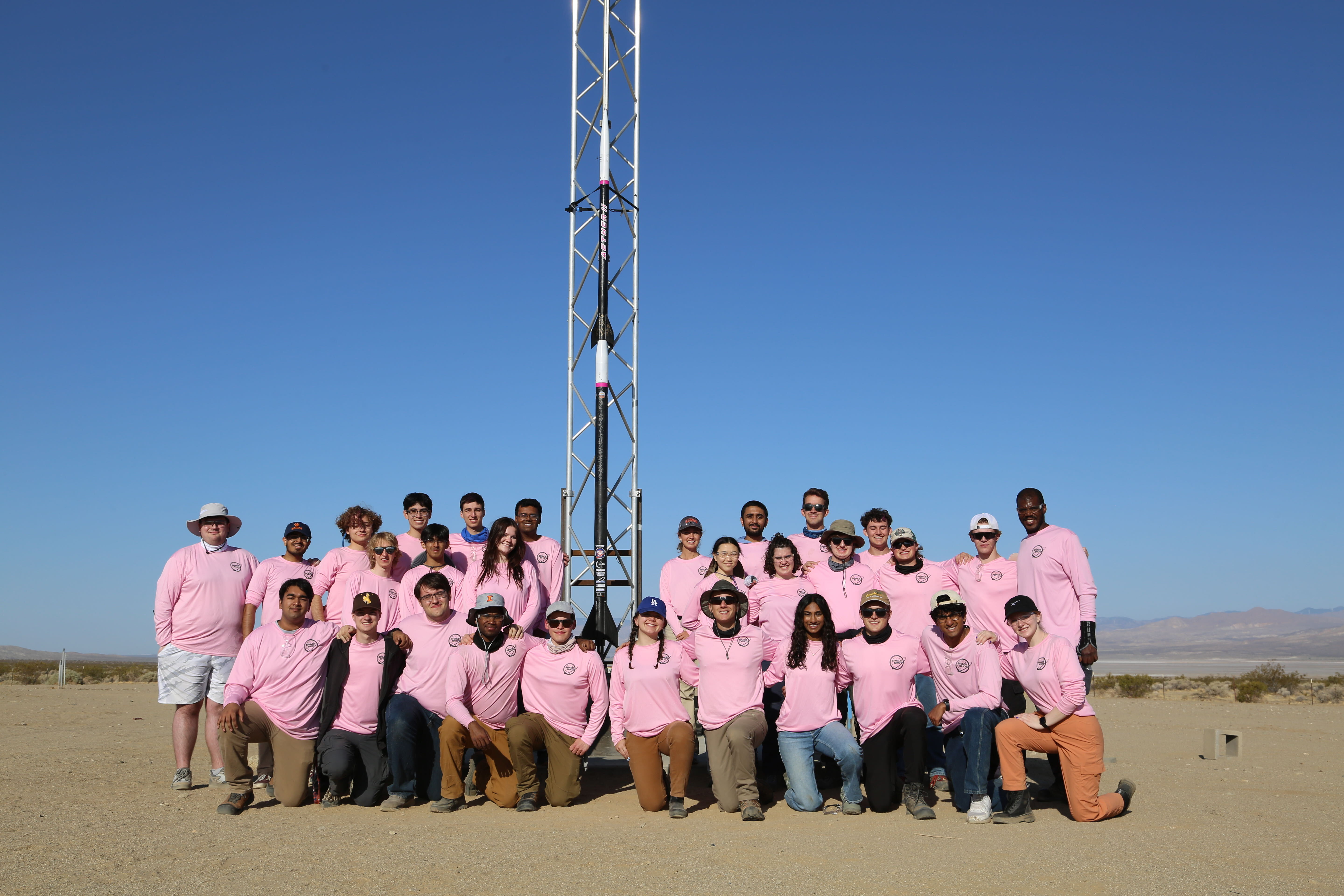 Members of Illinois Space Society's Spaceshot team at the Friends of Amateur Rocketry in June 2025. Front row left to right: Mihir Shevade, structural design and analysis subteam lead; Thomas McManamen, electronic hardware subteam lead; Michael Karpov, avionics lead; Surag Nuthulapaty, operations lead; Peter Giannetos, spaceshot team lead; Ashley Sawa, structures lead; Cameron Steelberg, recovery lead; Navya Meka, avionics structures subteam lead; James Lippert, fabrication subteam lead; Shishir Bhatta, guidance, navigation and control subteam lead; and Amber Parker  Middle row left to right: Lucas Lessard, Kushal Kulkarni, Madelyn OConnell, Angelina Yan, Emily Kyroudis, William King, Gage Bingaman, Drew Murphy, John Williams, team Mentor  Back row left to right: Benjamin Litvak, Divij Garg, Ajax Bachor, Ryan Verrette, Seth Blumenthal, Keshav Balaji, Lillian Hunt, Aneesh Ganti, Andrew Kern, Jace Whitted