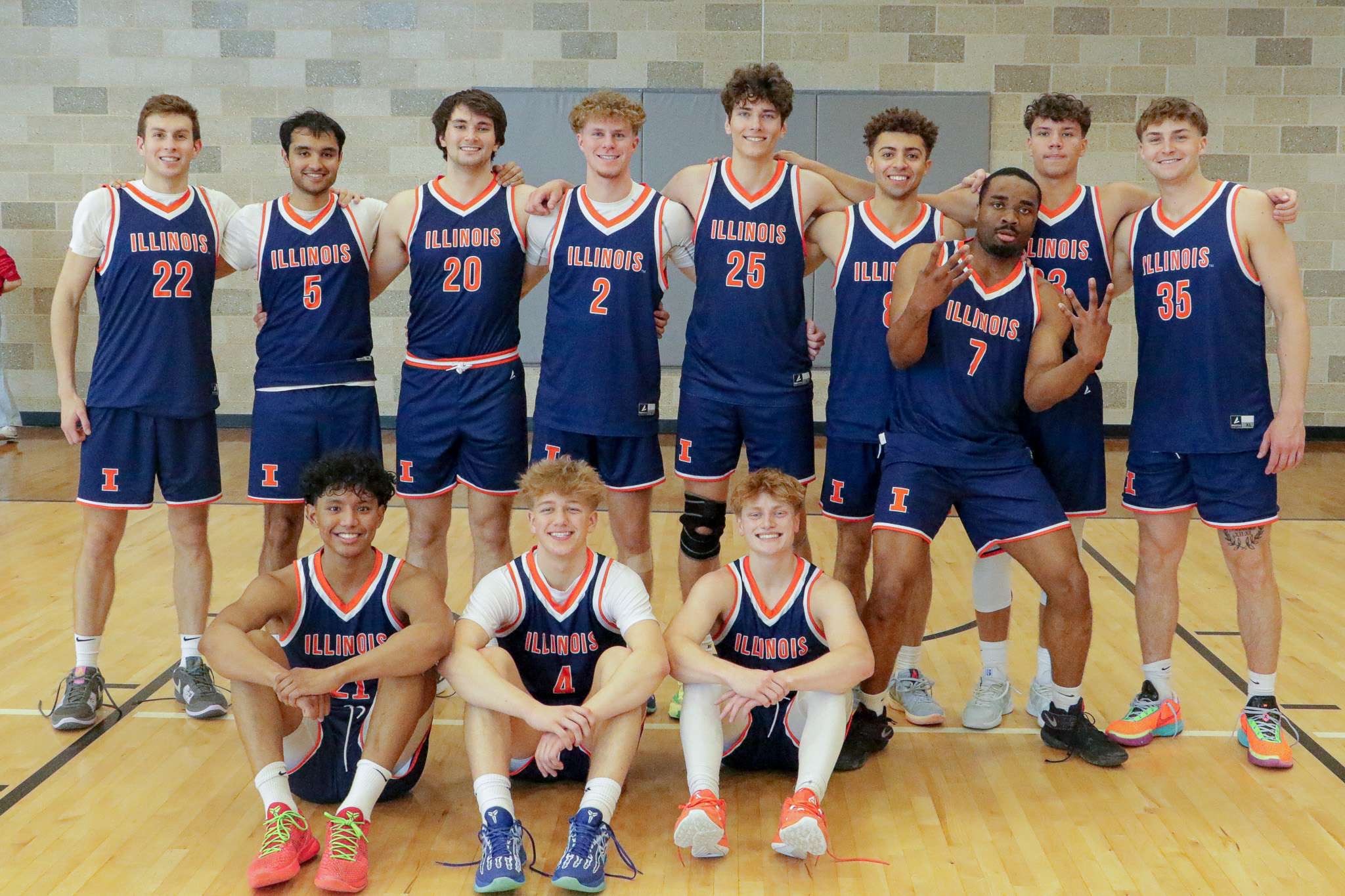 Zach Baker, wearing jersey number 35, with his Illinois basketball club team