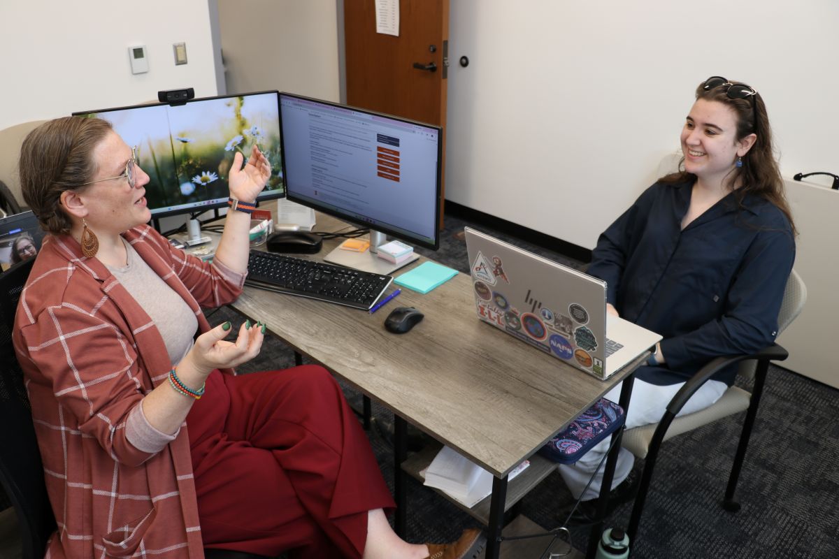 Laura Gerhold in her office with AE undergrad Hannah Speranza.