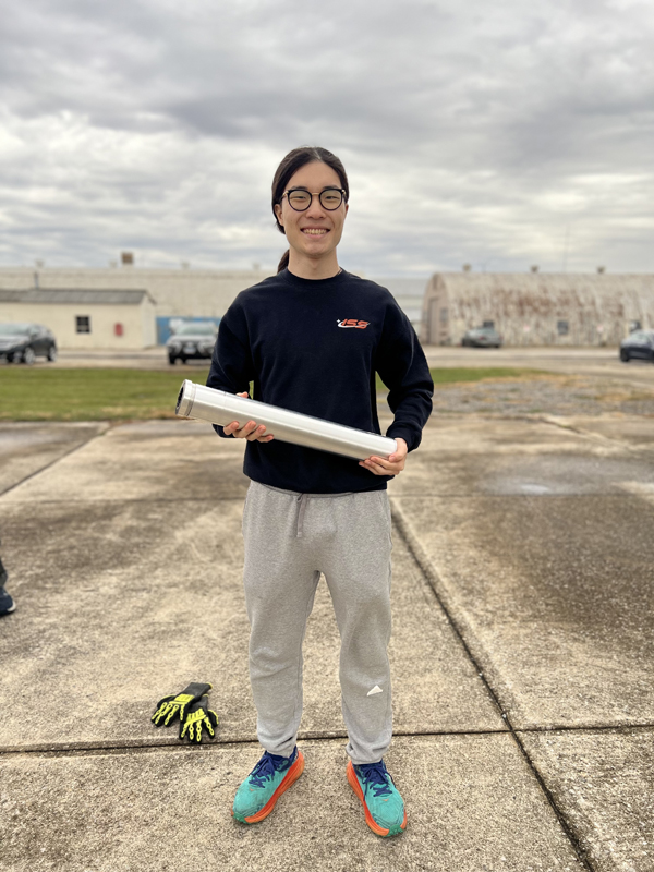 Vincent Kim holding the Clotho motor.)