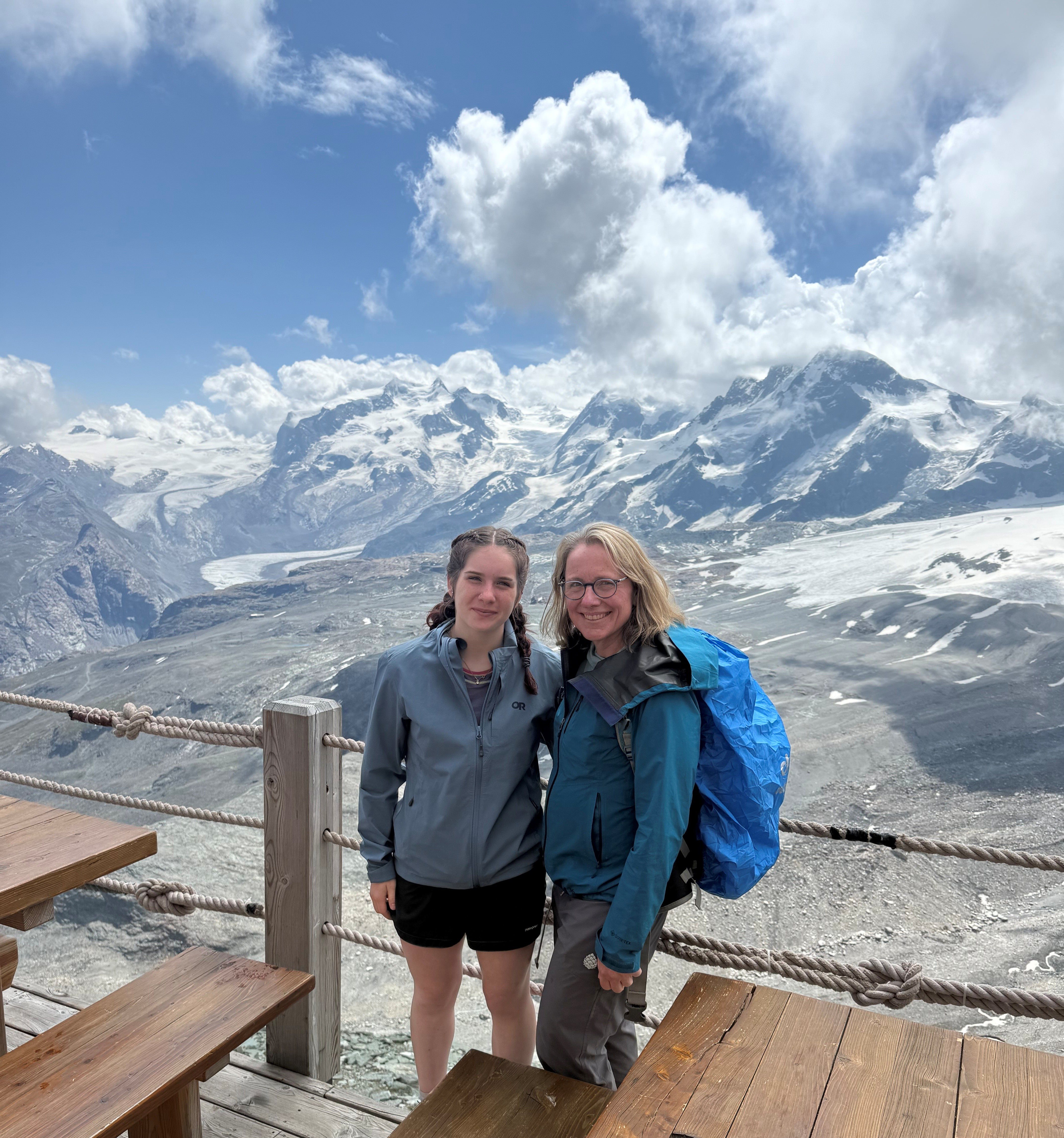 Kendra Sharp with her daughter, Josie Hill, while hiking in Switzerland in 2025/ and I in Switzerland hiking Summer 2025.
