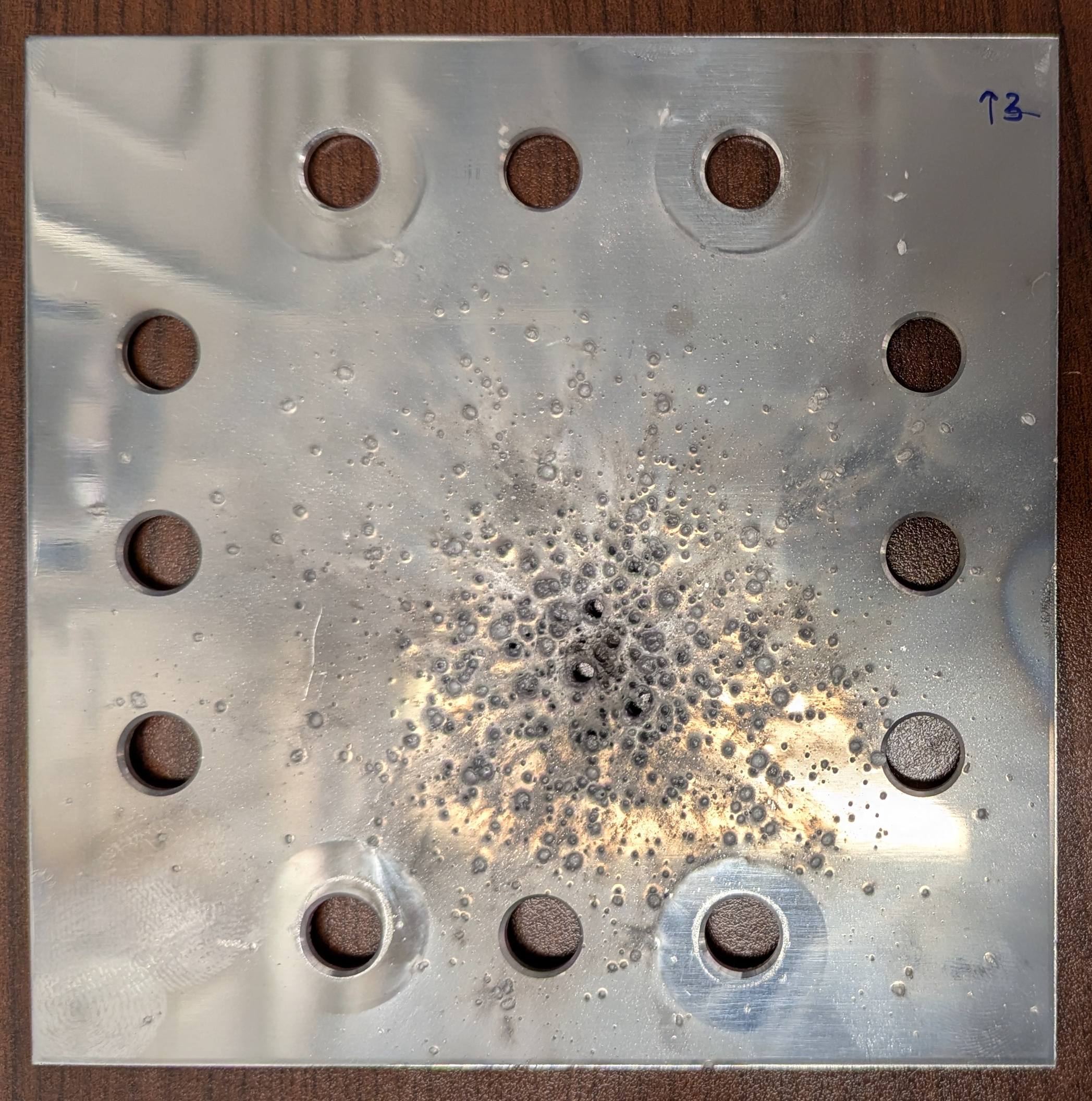 Example of the impact on the second plate, the witness plate.