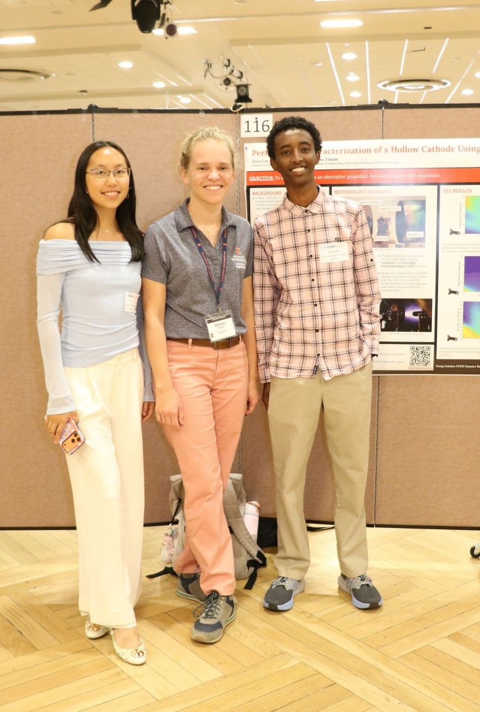 Allison Timm, center, with high school students Ziya Lu and Mohamed Omar.