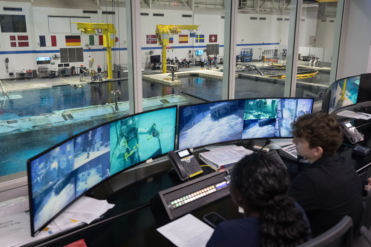 Max Alchin (right) and Tiana Foreman (left) monitor diver operation of ATHENA from the test control room.