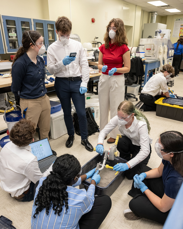 Test week team conducts lunar simulant testing on ATHENA in the Simulant Development Laboratory.