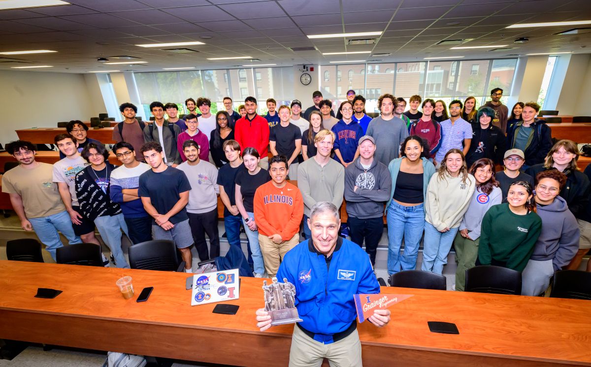 Hopkins poses with an aerospace engineering senior design class in October 2025 when he was on campus for AE's alumni board meeting.