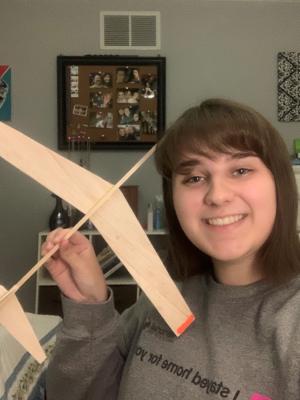 Click on this photo of Abby LeBar for a video of the test flight of the glider she designed and built during virtual camp.