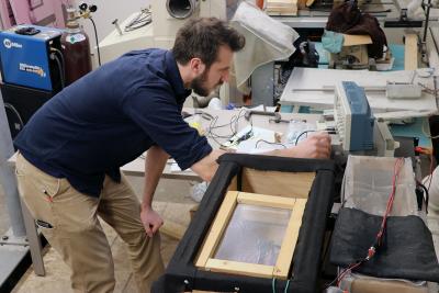 Matthew Paliwoda working in his lab.