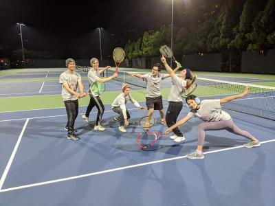 Carroll, second from right, with MIT intramural tennis team after winning the championship match.