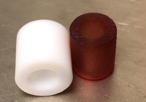 Photograph of PTFE (left) and HIPEP (right) propellant samples used in the test