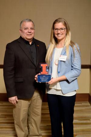 Samantha McCue with AE Professor Michael Lembeck at the 2019 awards banquet