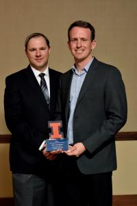 Associate Professor Jason Merret with Klingebiel at the alumni awards banquet