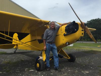 Maughmer with his 1946 Piper J-3 Cub 