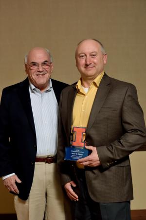 Professor Larry Bergman with Jason Ditman at the AE awards banquet in April.