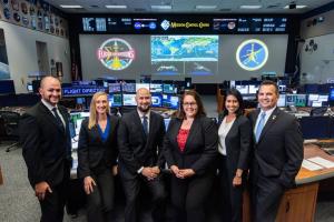 The 2018 Class of NASA Flight Directors for the Mission Control Center (left to right): Marcos Flores, Allison Bolinger, Adi Boulos, Rebecca Wingfield, Pooja Jesrani, and Paul Konyha. Photo courtesy of  NASA