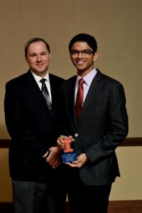 Associate Professor Jason M. Merret and Varun Bhargava