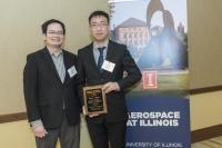 Haoran Wang, right, with Assistant Professor Huck Beng Chew (not pictured, co-recipient Dimitrios Antartis)