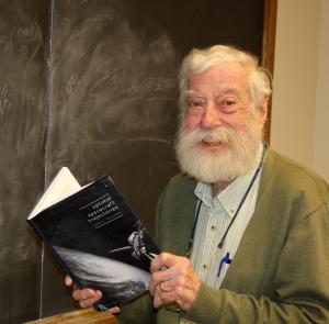 John Prussing with his new textbook.