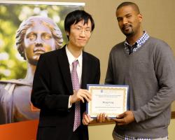 Meng Feng, winner of the AIAA Scholastic Achivement Award, with Assistant Prof. Kai James. (Not pictured, co-winner Jacob M. Dray)