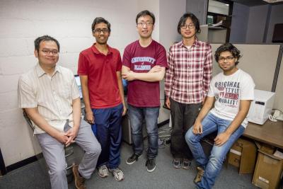 Huck Beng Chew, left, and his research group