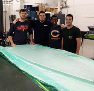 Hyperloop team in the workshop (l to r) Joe Sabuda, Kyle Weiskircher, Rishab Pohane, and Liam McHugh