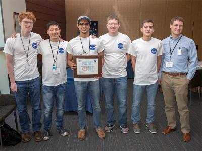 The Illinois team, from left: Austin Scott, Jose Tuason, Sashank Gummela, Sam Wywrot, Steven Kosvick, and AE Assistant Prof. Zach Putnam.