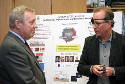 Sen. Durbin visited the lab of AE professor Scott White and MatSe professor Nancy Sottos at Beckman to learn about their work in self-healing materials.