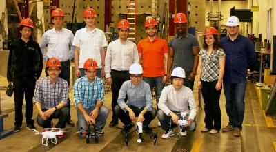 Members of the autonomous vision-based robotic system project include front row (l-r) Kevin Han, Jacob Lin, Joseph DeGol, and Ka Wai Tsoi; back row (l-r) Xinke Deng, Tim Bretl, Derek Hoiem, Mani Golparvar-Fard, Nour Dabboussi, Joseph Yaw Darko Akyeampong, Rebecca Nothof, and David Hanley