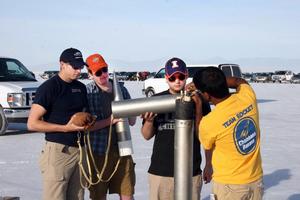 Members of the Illinois team get the rocket ready for launch.