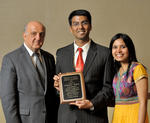 Prof. Tamer Basar (ECE) with Abhishek Gupta and Gupta's wife, Priyanka Aggarwal