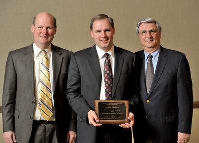 Department Head Philippe Geubelle with Jason M. Merret and Jason's father, James Merret, Jr.