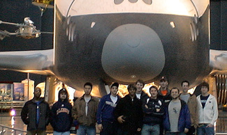 AE students pose in front of the Enterprise Shuttle, now kept at Dulles International Airport, Chantilly, Virginia, as part of the Smithsonian National Air and Space Museum.