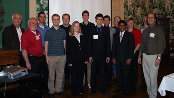 Award recipients, judges, corporate panlists and conference representatives in the recent AIAA Student Regional Conference on the Urbana campus were as follows: (front row, from left) Sy Liebergot, keynote speaker; Brandon Gulker, Sarah Lane, Ian Tobasco; Sivaram Gogineni, AIAA regional representative. Stephen Brock, AIAA national representative; (second row, from left) Bob Wood, Northrop Grumman; Michael Thake, Matt Schuster, Nick Schifer, Cedric Langbort, conference chair; Steve D&rsquo;surso, The Boeing Company; Gail Jankowski, Arrow Technical Services ; Barnaby Wainfan, Northrop Grumman. Award recipients not in this photo were Phil Martorana and Erik Kroeker. 