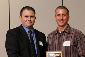 From left, student Jared Daum and AE Assistant Director of Advancement Brett S. Clifton.