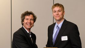 From left, AE Prof. Bruce A. Conway and student Chris Martin.