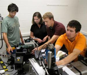 Associate Prof. Joanna M. Austin and several of her students in the Compressible Fluid Mechanics laboratory.