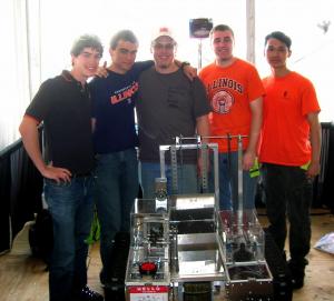 The IRIS team includes these AE undergraduates (from left) IRIS President Jordan Holquist; Gregory P. Doidge of Princeton Junction, N.J.; John W. Alaimo Jr. of Lake Forest, Ill.; Steven H. Turner of Naperville, Ill.; and Li X. Pan of Chicago; with their robot 'IRIS-1' in the Kennedy Space Center 'Lunapits.'