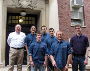 Steve D'Urso, far left, directed the new Aerospace Systems Engineering master's degree. The degree's first graduates were, from left, Jonathan Yong, Richard Strope, Phil Hornstein, Bryan Withrow and Brendan Lane. Graduate student Drew Ahern, far right, served as the program's teaching assistant.