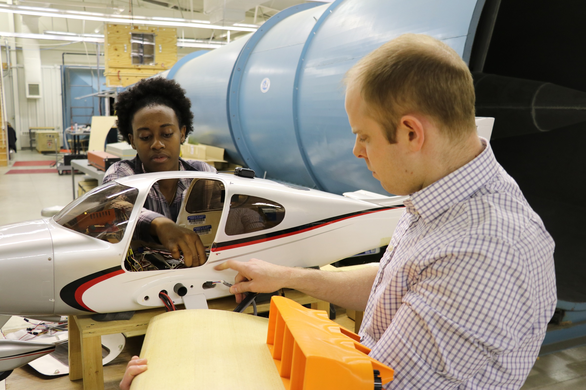 Awate working with Phillip Ansell in the wind tunnel lab.