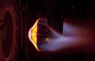 The Arc Jet Complex at NASAâ€™s Ames Research Center in Californiaâ€™s Silicon Valley conducts heat simulation testing on a conceptual heat shield prototype. Credits: NASA