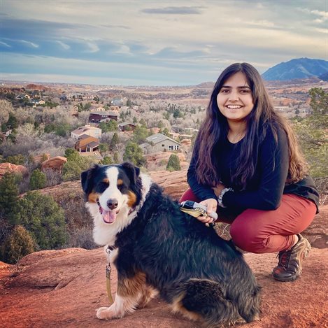 Nigam with her dog Murphy hiking in Garden of the Gods