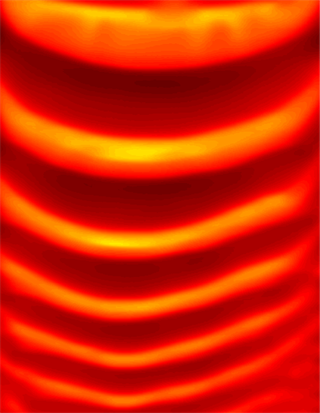 This patterned thermal profile is obtained during the free-surface frontal polymerization of dicyclopentadiene in a straight channel.
