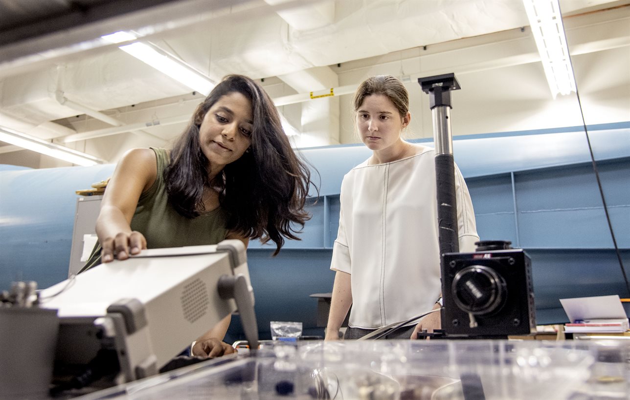 Theresa Saxton-Fox, right, in lab with graduate student Aadhy Sundarajan Parthasarathy