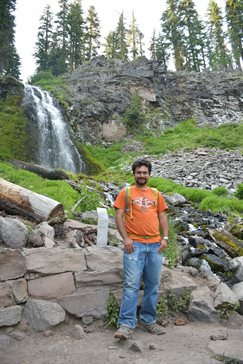 Saptarshi Bandyopadhyay hiking at Crater Lake National Park