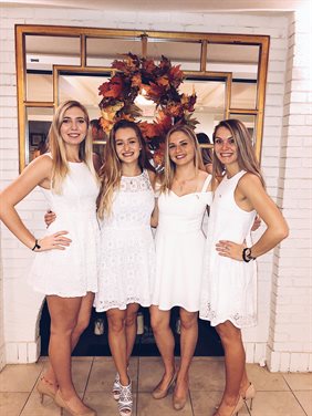 English, second from left, with sorority pledge sisters.